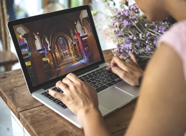 Watching a funeral live stream from home