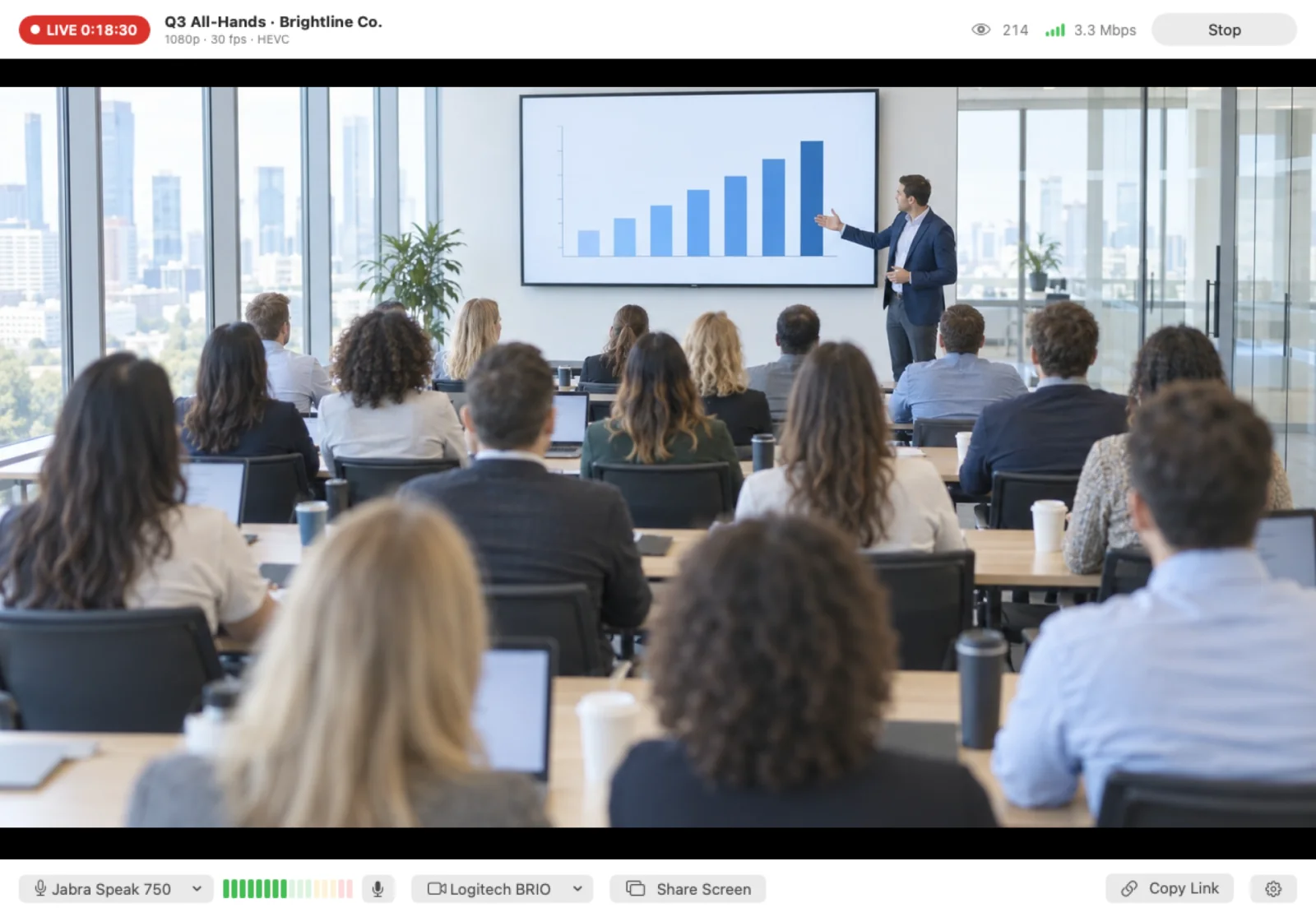 The EventLive for Mac Studio live streaming a company all-hands meeting in 1080p, with microphone and camera menus below the picture